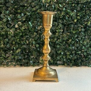 Georgian polished brass candlestick shaped column raised on square footed base
